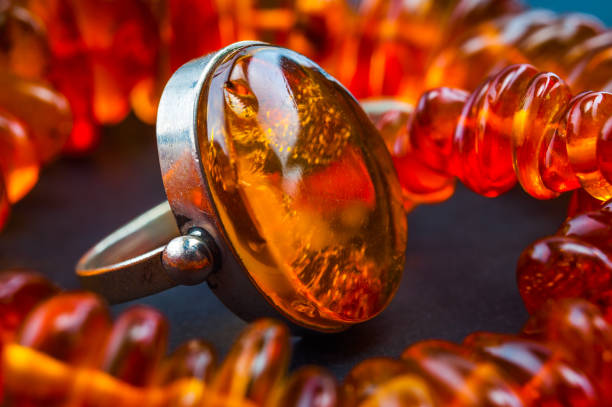 Ring with amber close-up stock photo