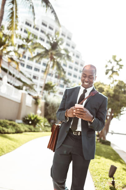 istock businessman on the phone in miami 914102918