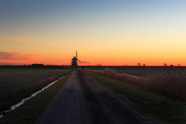 istock Windmill de Goliath at sunset in winter 914104744