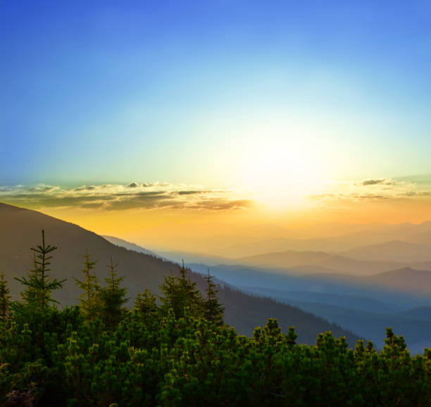 istock mountain slope in a blue mist at the sunset 914105094