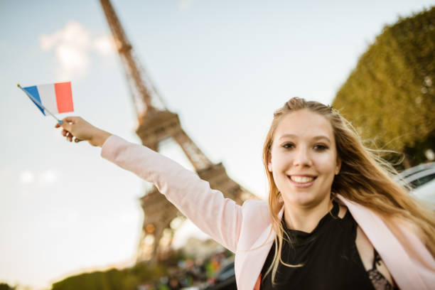 istock woman waving the flag in paris 914108310