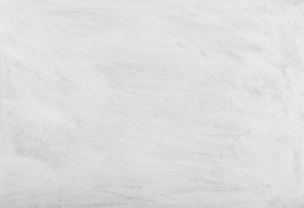 istock White washed painted textured abstract background with brush strokes in gray and black shades. 914111408