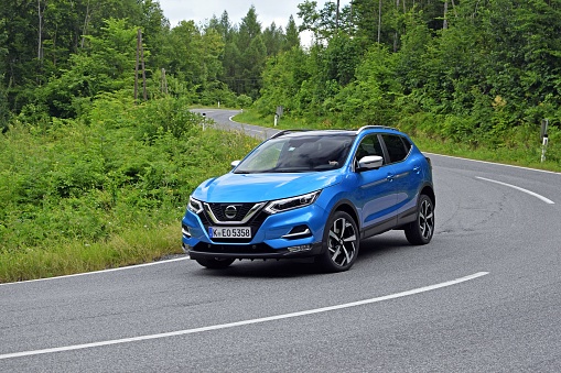 Vien, Austria - June, 26. 2017: Second generation of Nissan Qashqai (after facelifting) driving on the road. The Qashqai is the most popular SUV/crossover on the European market.