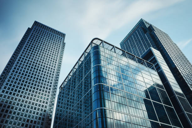 London, office buildings Canary Wharf in dusk Financial District Glass Buildings, City of London inner london stock pictures, royalty-free photos & images