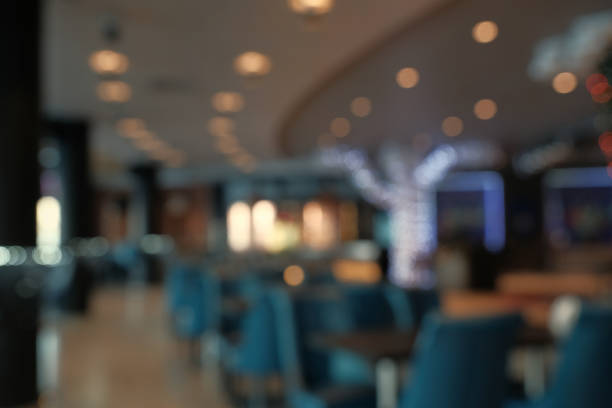 istock Abstract blur restaurant interior for background. Blur coffee shop or cafe restaurant with abstract bokeh light image background 914123910