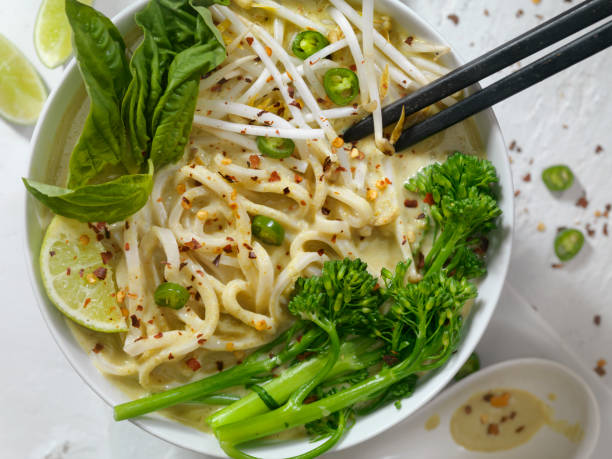 istock Green Curry Noodle Soup with Broccolini, Bean Sprouts and Fresh Basil, 914126106