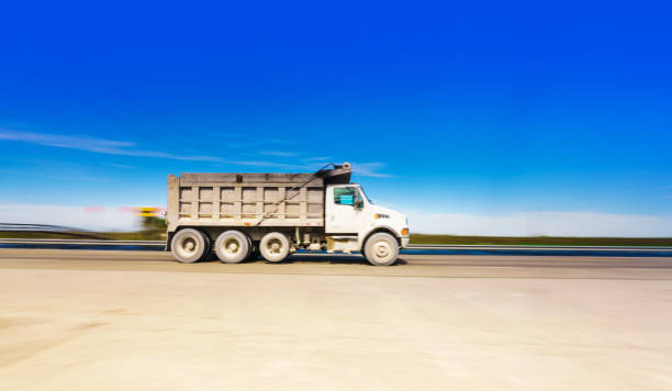 istock Dump truck on the highway 914127746