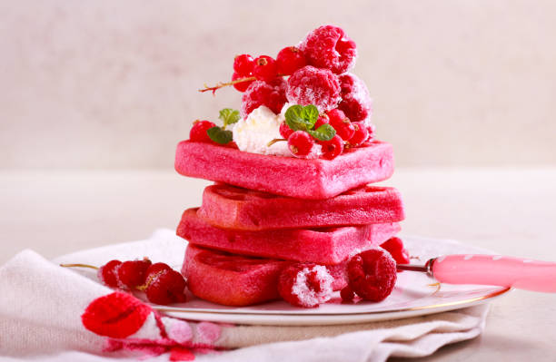 istock Red velvet waffles with berries 914127820