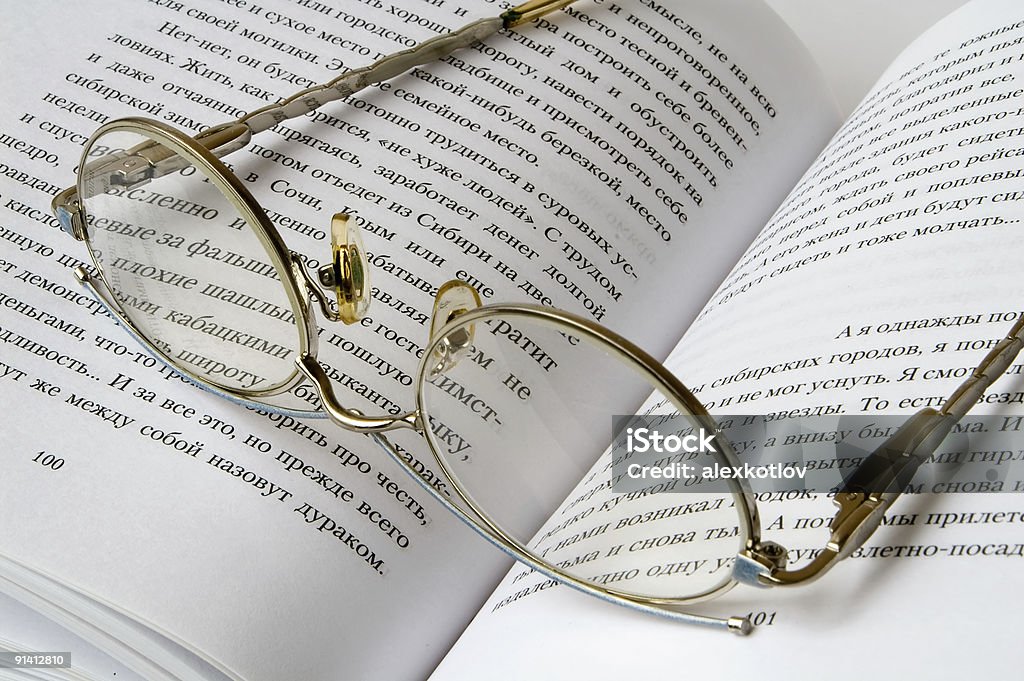 Glasses On Book  Paragraph Stock Photo