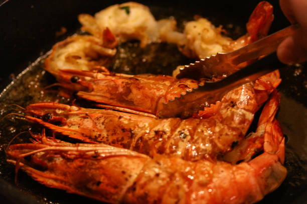 istock King Prawns sizzling in Pan 914130478