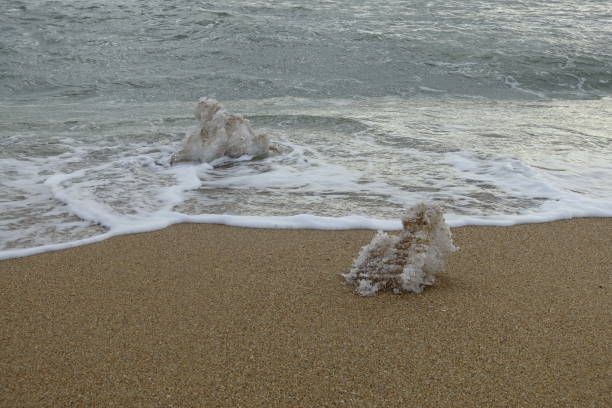 istock Snow and ice on the beach. 914134654