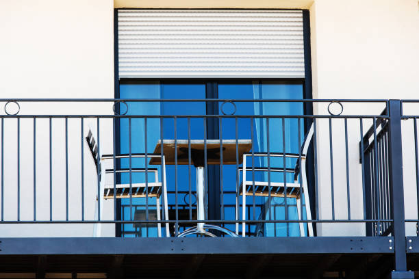 istock Apartment terrace with a small table and two chairs 914141508