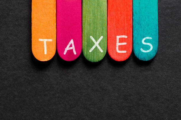 istock Taxes Word on Wood Block 914145354