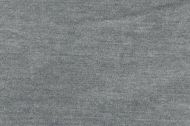 Fond gris, fond de jeans denim. Texture jeans tissu. - Photo