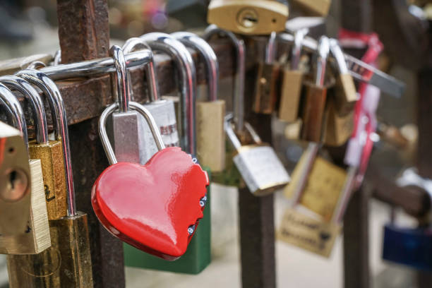 istock love symbol padlocks chained on bridge 914152062