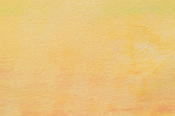 istock orange painted aristic watercolor texture background 914154560