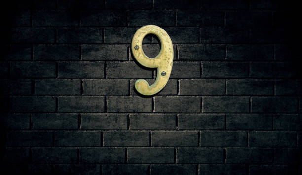 istock Old house number sign on wall 914158938