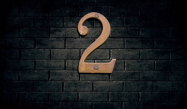istock Old house number sign on wall 914158940