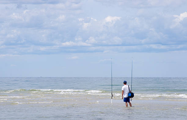 Surf Casting  sea fishing stock pictures, royalty-free photos & images