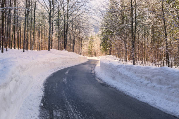 istock Snowy winter road in Julian Alps 914159604