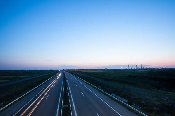 Cars speeding on a highway near city Szeged, Hungary