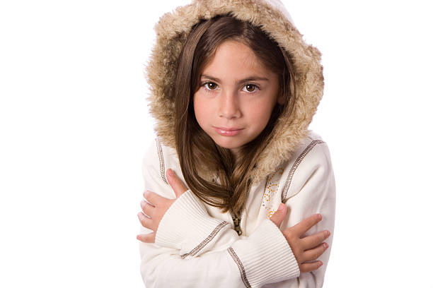 sad and cold little girl stock photo