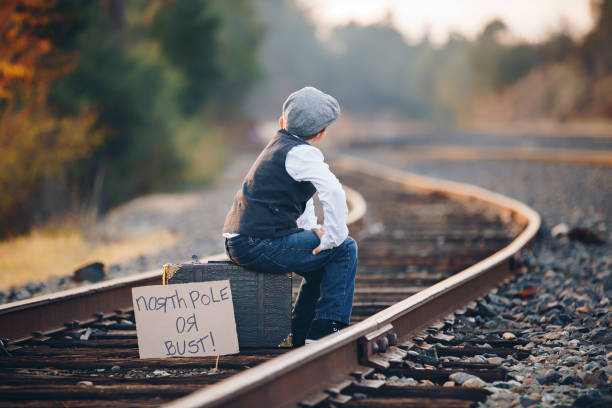 istock Young Boy Waiting for Train to North Pole 914173346