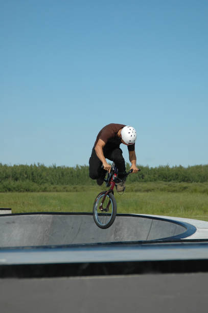 istock Biker goes airborne performing trick in skatepark. Lots of copyspace. 91417496