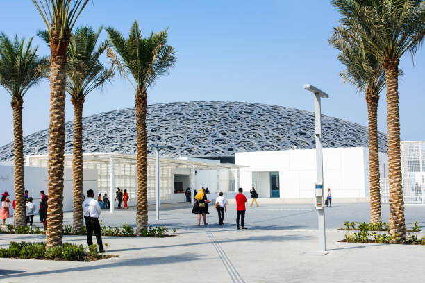 ABU DHABI, UNITED ARAB EMIRATES - JANUARY 26, 2018: Louvre Abu Dhabi building exterior on a sunny day