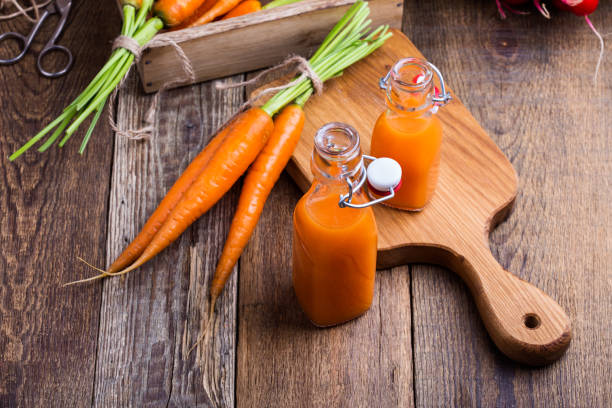 istock Freshly squeezed carrot juice and fresh vegetables 914192126