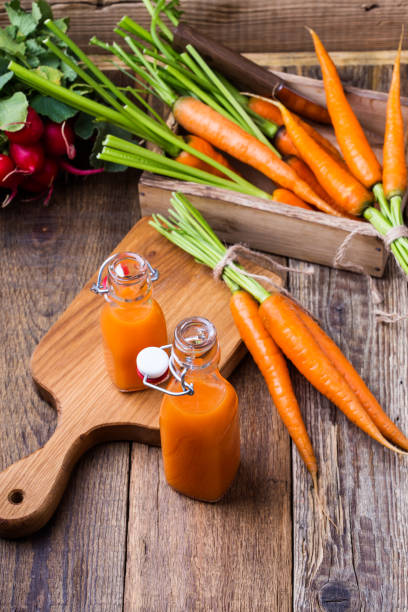 istock Freshly squeezed carrot juice and fresh vegetables 914192374
