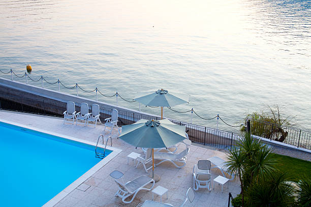 istock Swimming pool by the lake at evening time 91419295
