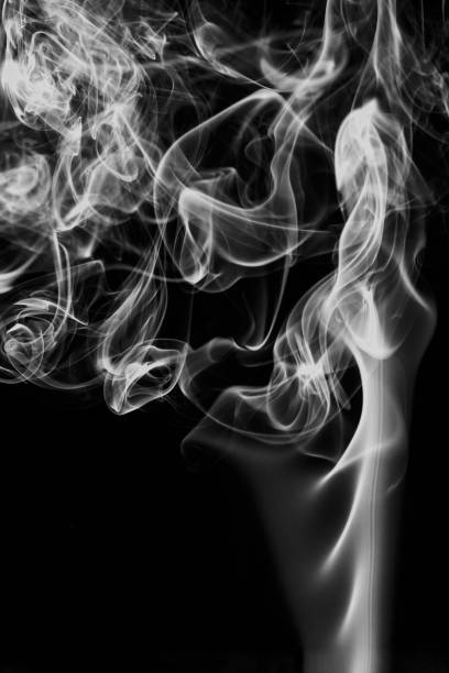 istock Abstract monochrome smoke isolated on a black. 914193058