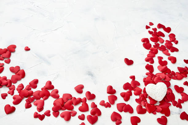 istock Small red hearts on white background. Valentines Day concept. Top view, copy space 914198006