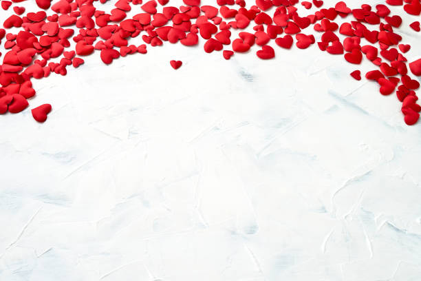 istock Red hearts border on white background. Valentines Day background. Top view, copy space 914198230
