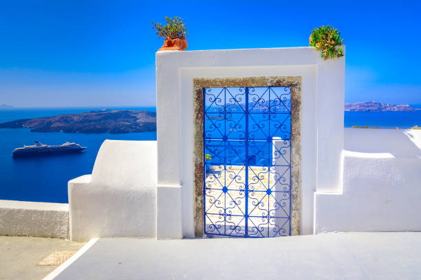 Close blue gate above sea, Greece, Santorini Island, Oia