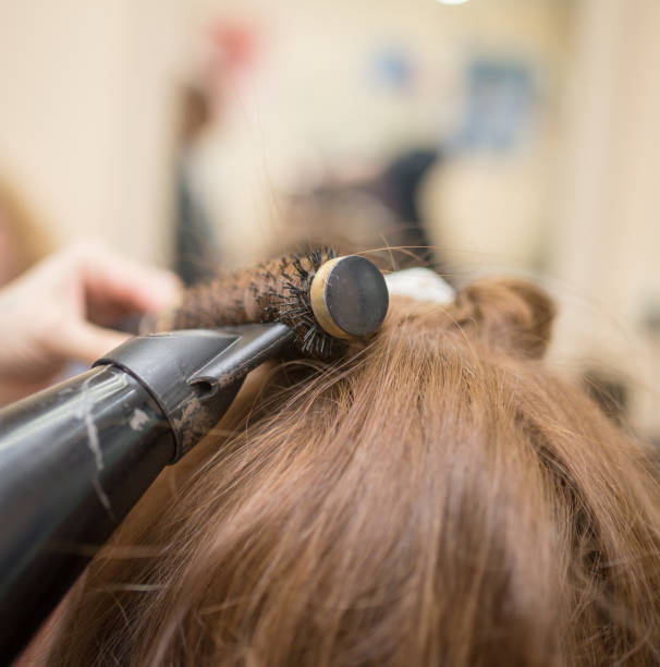 istock blow-drying in a beauty salon 914213294