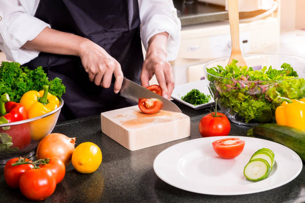 istock Midsection Of Chef Preparing Food 914213996
