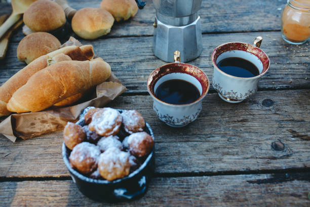 istock Coffee and sweets on the wooden table 914214158