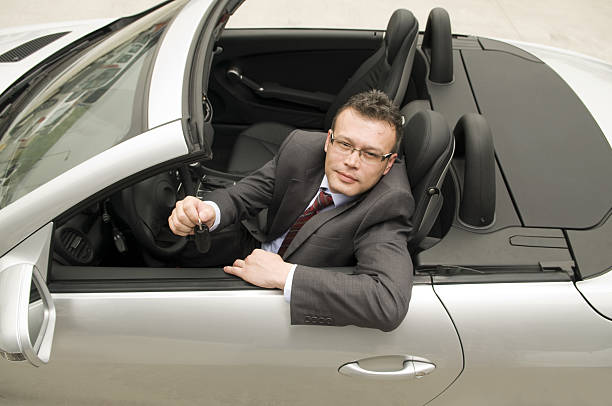 istock Man showing the car key 91421716