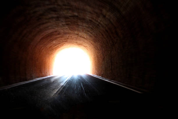 light at the end of the tunnel a picture of light at the end of the tunnel light at the end of the tunnel photos stock pictures, royalty-free photos & images