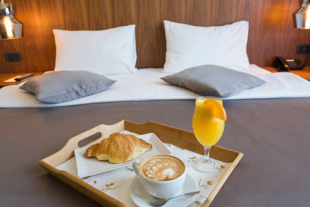 istock Breakfast in bed, hotel bedroom interior 914223372