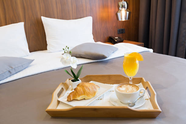 istock Breakfast in bed, hotel bedroom interior 914224636