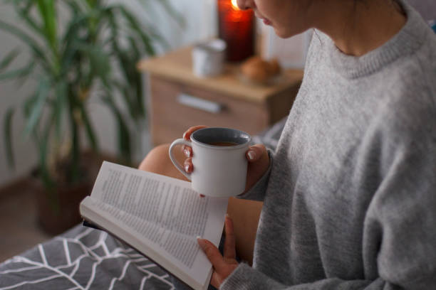 istock Enjoying a good book in bed 914239836