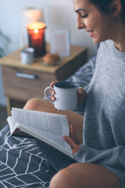 istock Enjoying a good book in bed 914241590