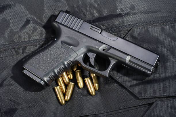 istock Police weapon and equipment on black uniform background 914241954