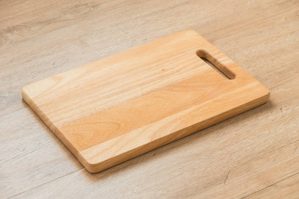 istock Close-Up Of Wooden Cutting Board On Table 914253440