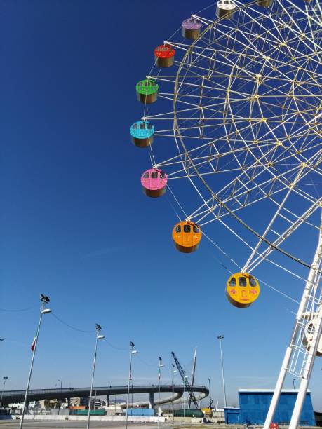 istock Low Angle View Of Ferris Wheel Against Clear Blue Sky 914256436