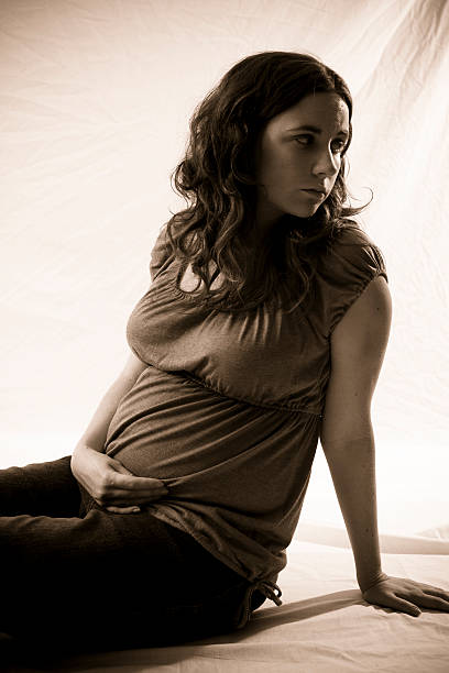 istock Pregnant Woman Looking Over Should 91426503