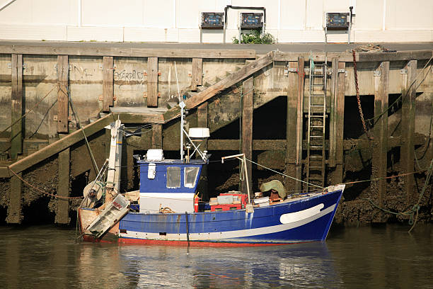 Fishing boats anchor.